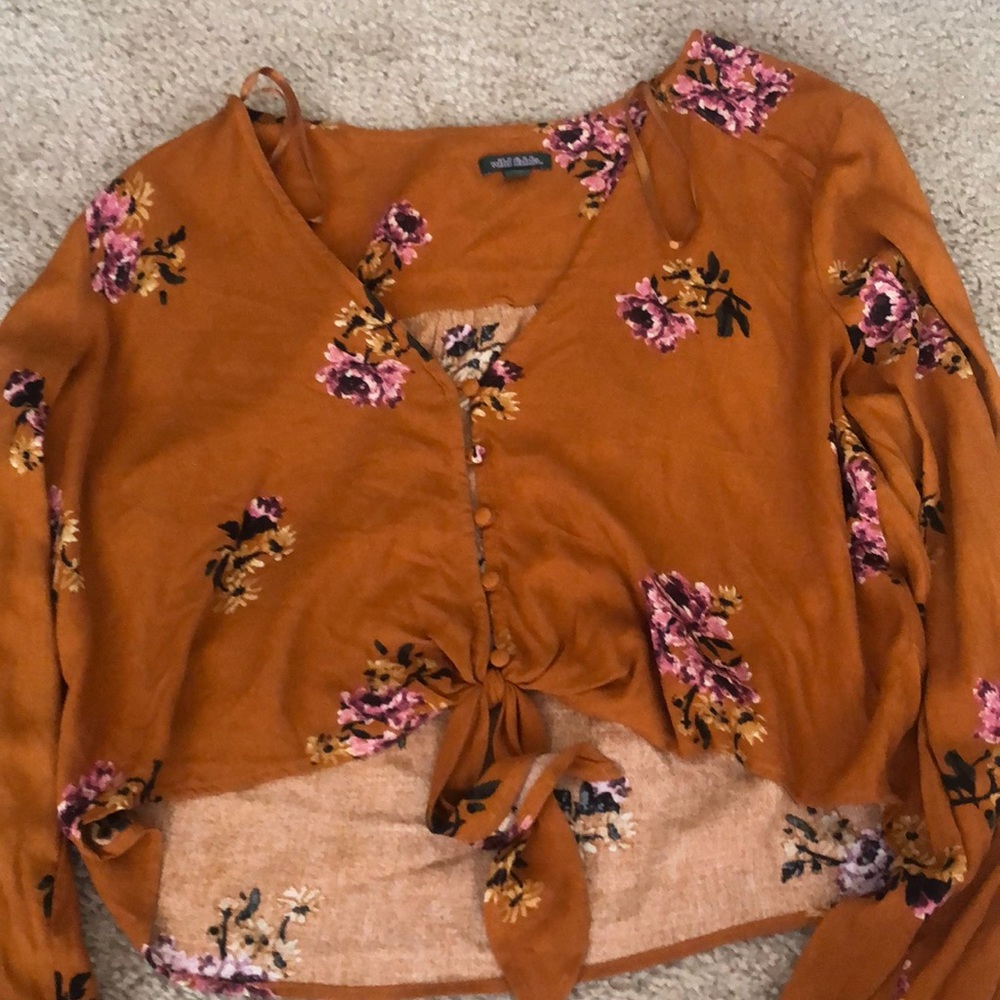 a floral long sleeve top